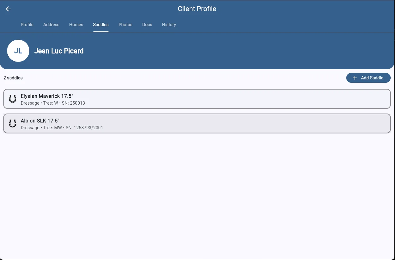 SaddleWorks client profile saddles tab showing associated saddles with make, model, tree size, and serial numbers